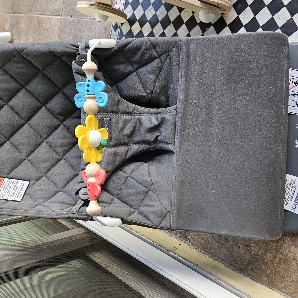 The Must Have Baby Bjorn Bouncer With Toy. In Like New Conditoion. No Damage.
